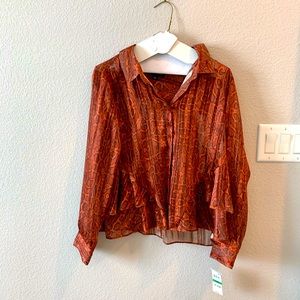 Brand new INC blouse, slightly see through.